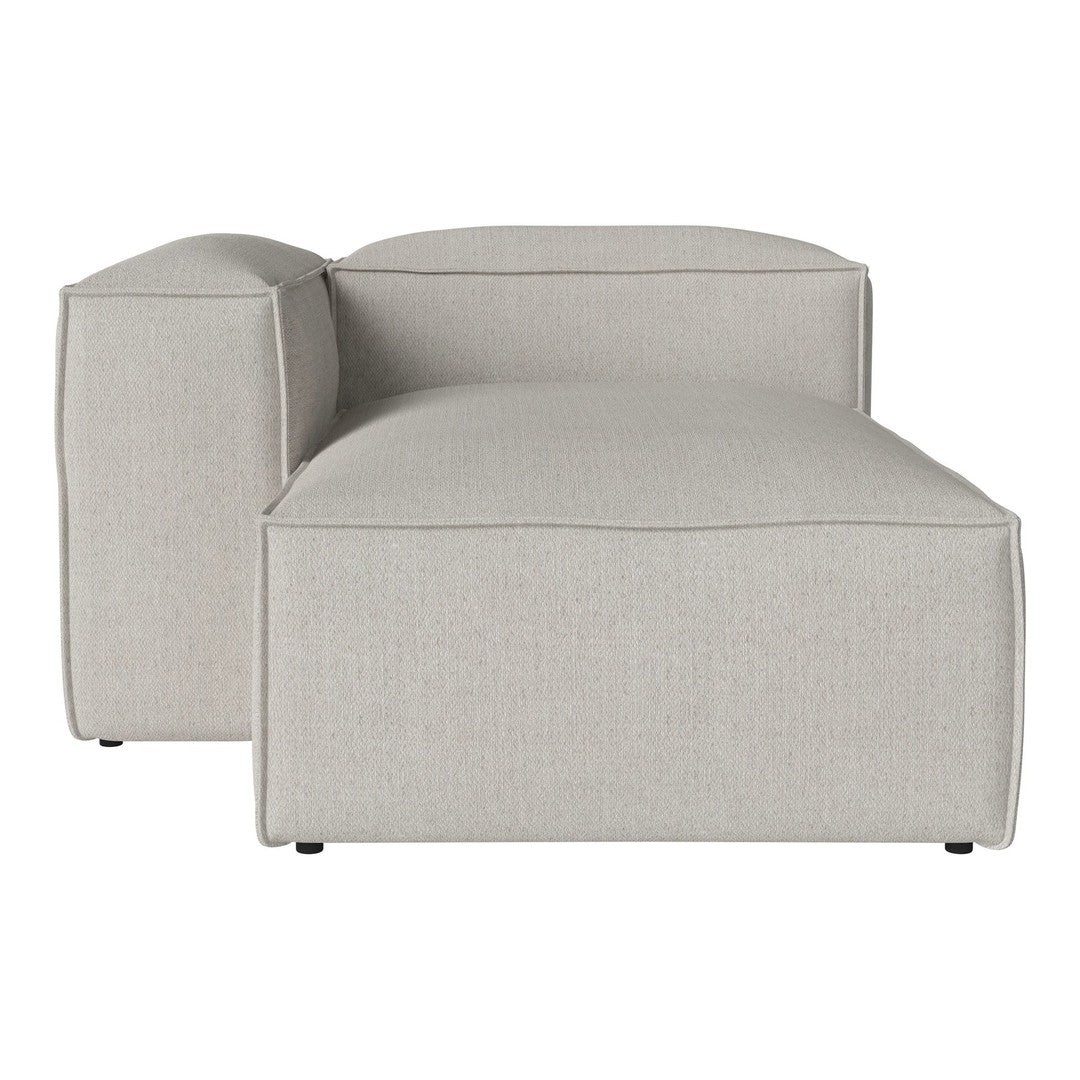 Light gray sectional couch with a smooth, minimalistic design and no visible patterns. Perfect for modern decor.