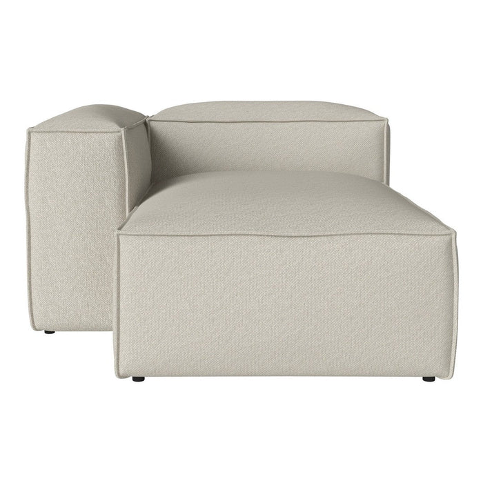 Beige modular sofa with a sleek, minimalist design and smooth, textured fabric. Ideal for modern interiors.