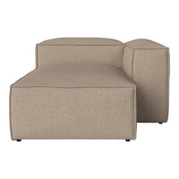 Beige modular sofa with a minimalist design, featuring a smooth, textured fabric and clean lines.