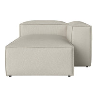 Beige upholstered ottoman with a textured finish and contemporary geometric shape. Perfect for modern decor.