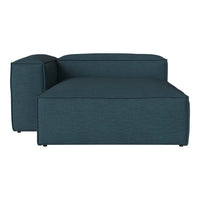 Dark teal upholstered chaise lounge with a sleek, minimalist design and subtle texture. Ideal for modern decor.