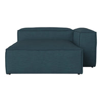 Teal minimalist armchair with a smooth, solid fabric texture, perfect for modern home decor.