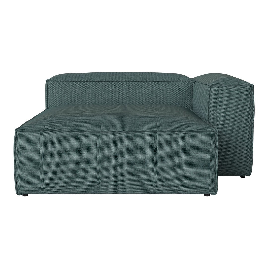 Teal upholstered sectional sofa with a smooth, textured finish, featuring clean lines and minimalist design.