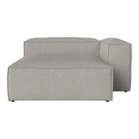 Light gray fabric sectional sofa with simple, modern lines and a sleek design. Perfect for contemporary living spaces.