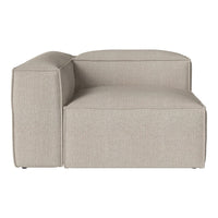 Textured light beige chaise lounge with minimalist design and clean lines, perfect for modern interiors.
