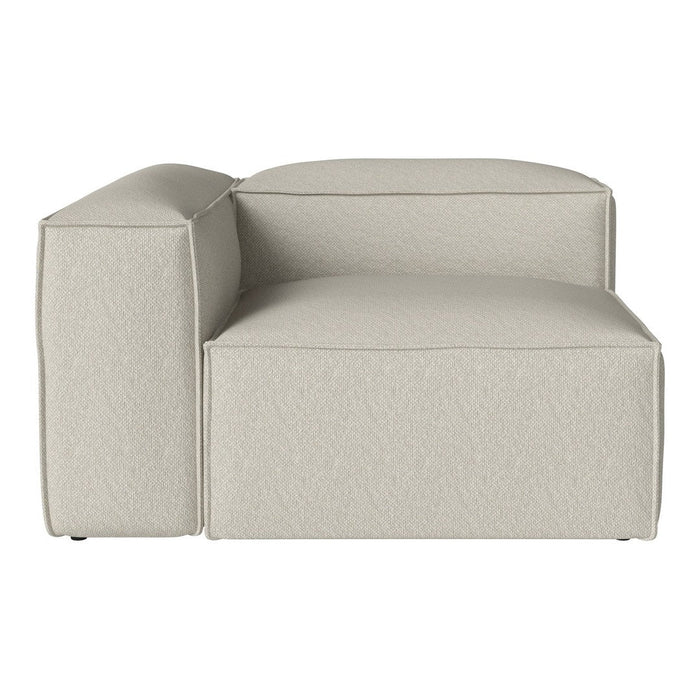 Light beige upholstered sectional sofa with a minimalist design and textured fabric. Perfect for modern interiors.