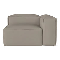 "Light gray modular sofa with smooth, minimalist design and no visible patterns."