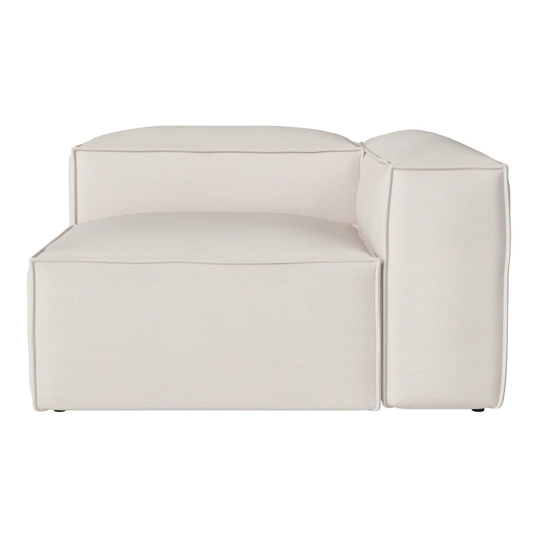 Cream-colored modular sofa with subtle ribbed pattern and clean lines, ideal for modern living spaces.