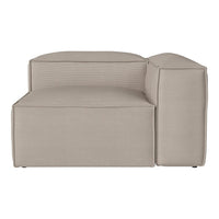 Beige modular sofa with subtle ribbed texture and clean, modern lines. Ideal for contemporary living spaces.