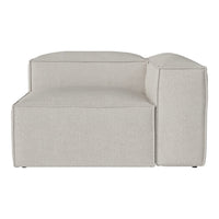 Light gray upholstered sectional sofa with a minimalist design and smooth, textured fabric. Ideal for modern decor.