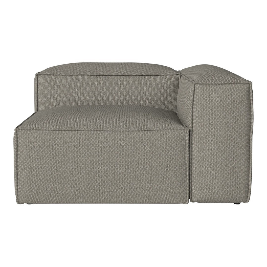 Gray textured upholstery on a modern sectional sofa, featuring a clean geometric design and soft surface.