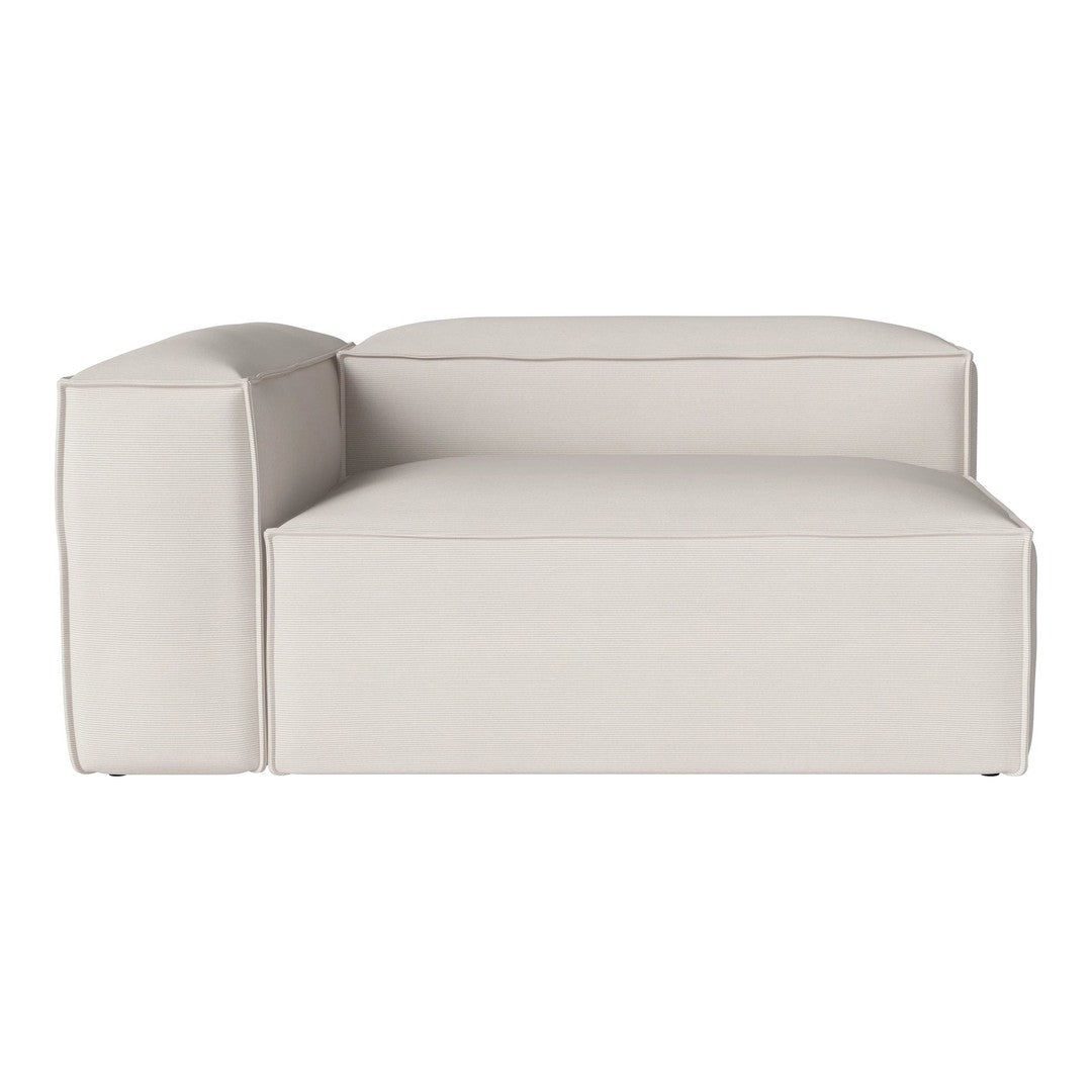 Beige couch with a textured ribbed pattern and clean lines for a modern look. Ideal for contemporary settings.