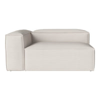 Beige couch with a textured ribbed pattern and clean lines for a modern look. Ideal for contemporary settings.