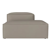 Beige modular sofa with sleek, minimalist design and smooth fabric texture. Perfect for modern interiors.