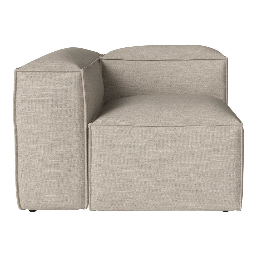 Beige sectional sofa with a smooth, textured fabric and minimalist design, perfect for modern interiors.