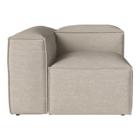 Beige sectional sofa with a smooth, textured fabric and minimalist design, perfect for modern interiors.