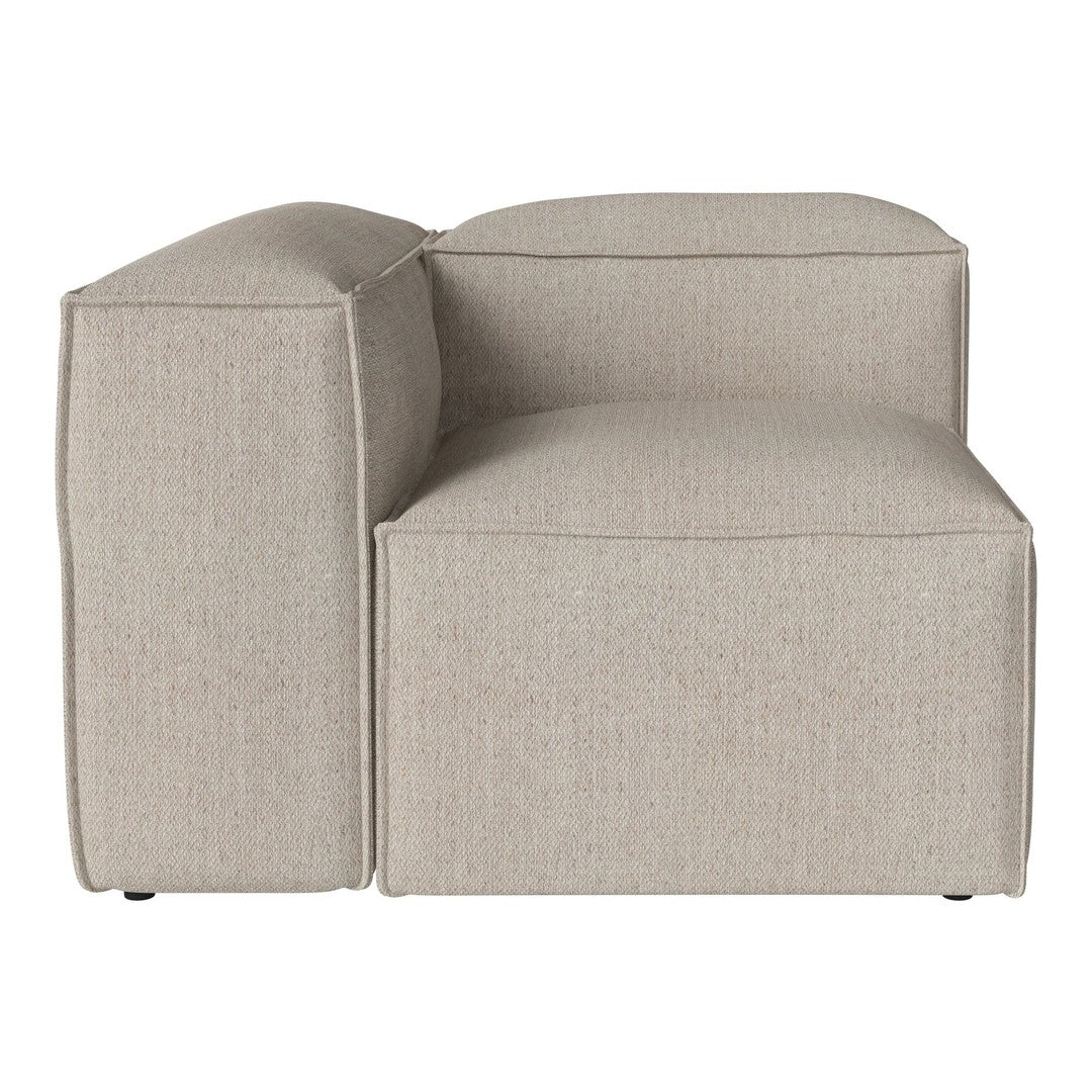 Light beige corner sofa with a smooth, textured fabric. Minimalist design and clean lines.