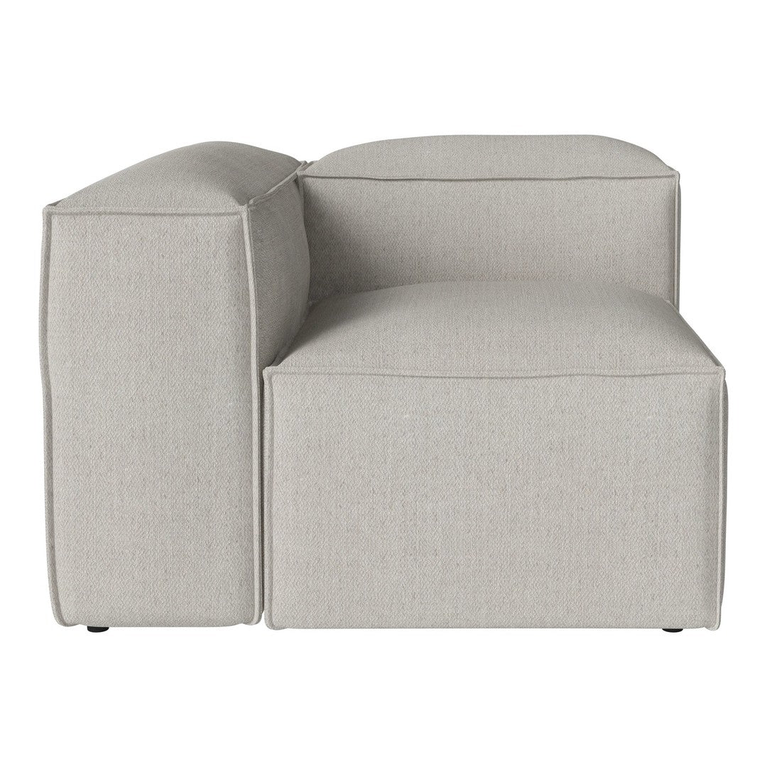 Light gray sectional sofa with a smooth, minimalist texture and no patterns, ideal for modern decor.