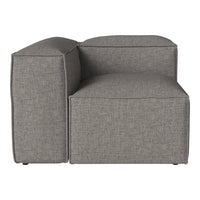 Gray upholstered sectional sofa with a textured, minimalist design, featuring clean lines and a boxy silhouette.