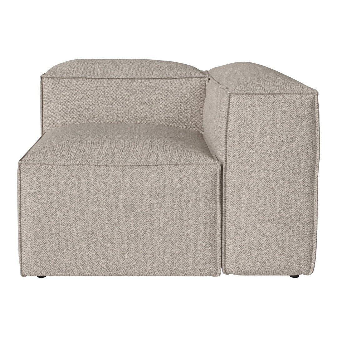 Beige textured sofa section with a minimalist design, featuring smooth lines and a modern block shape.