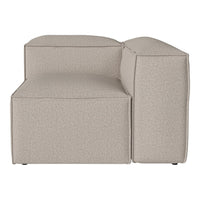 Beige textured sofa section with a minimalist design, featuring smooth lines and a modern block shape.