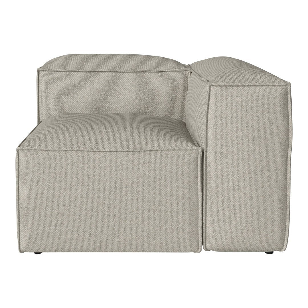 Light beige sectional sofa with a smooth, textured fabric and minimalist design. Perfect for modern interiors.
