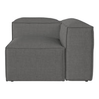 Gray upholstered modular sofa with a minimalistic design, featuring a solid color and clean lines.