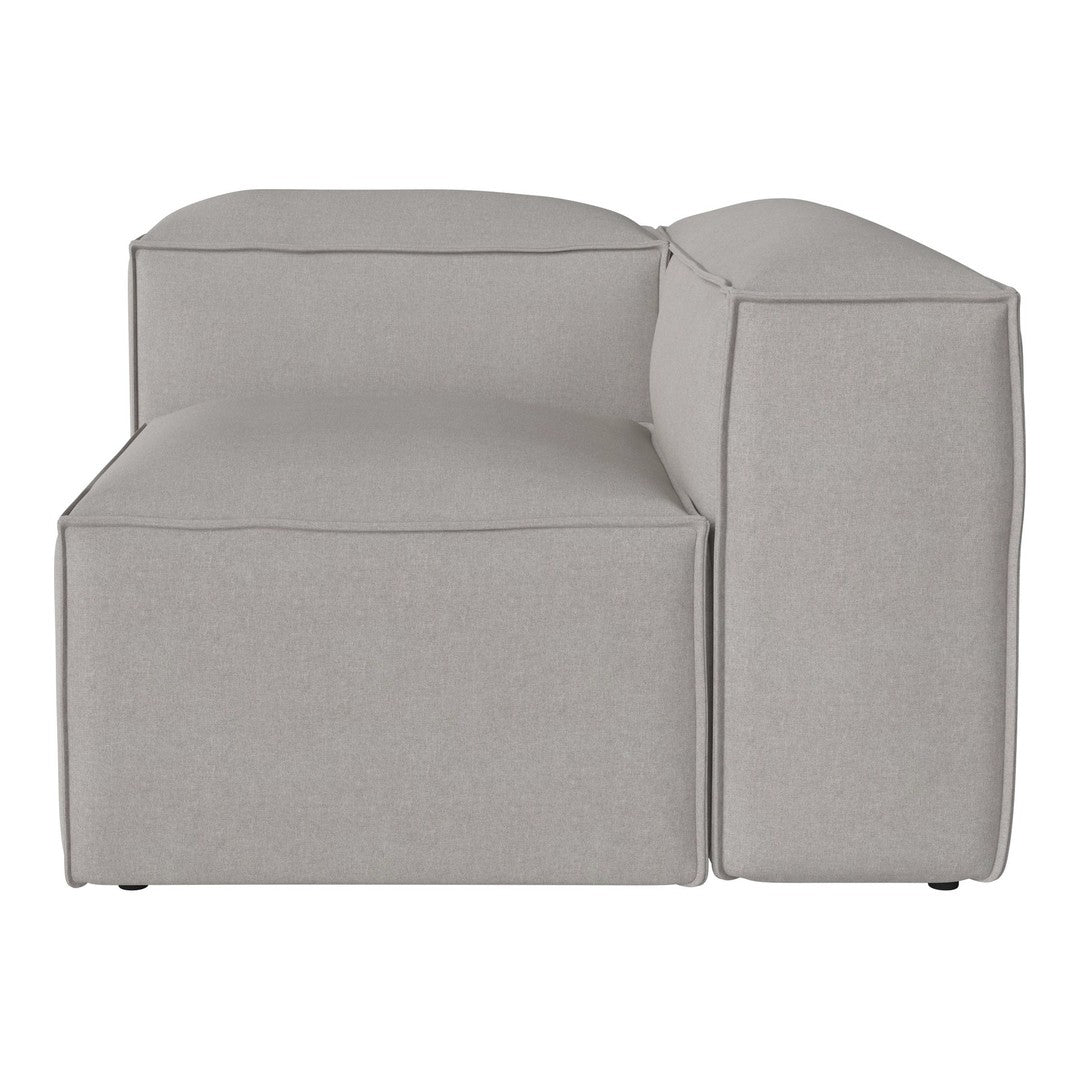 Gray upholstered sectional sofa with a minimalist design and smooth texture, perfect for modern decor.
