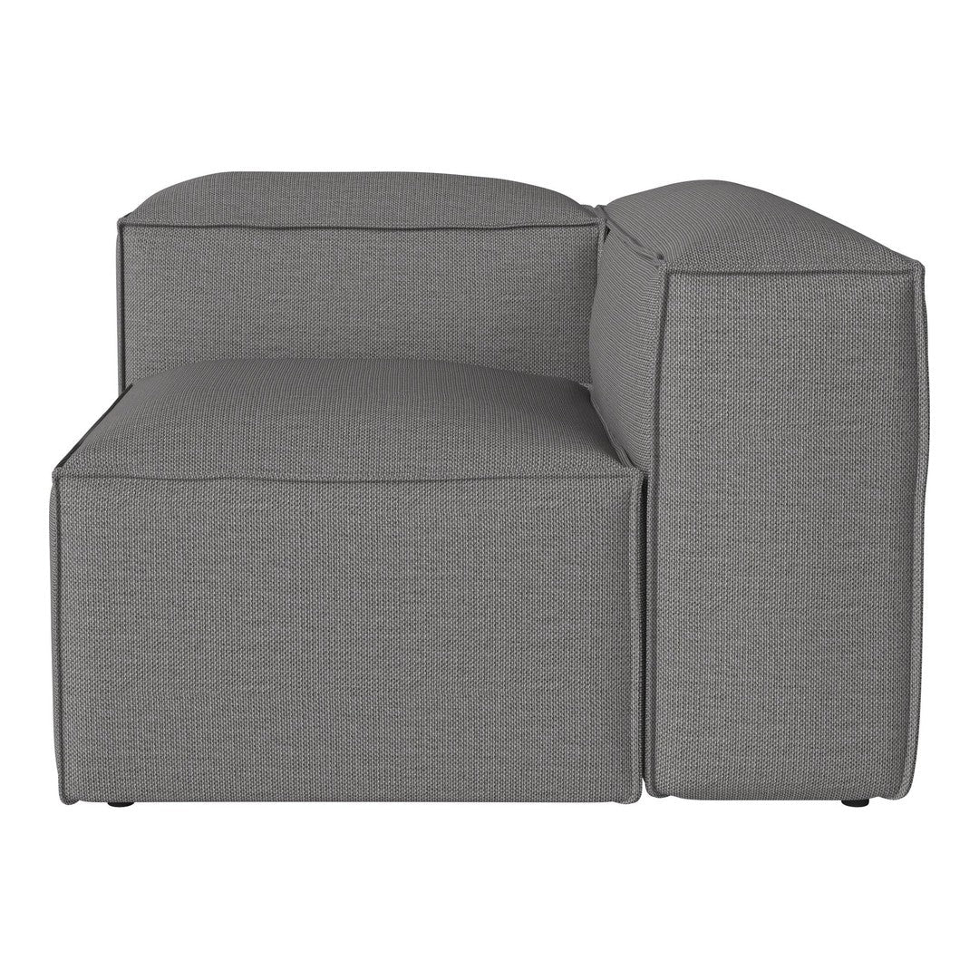 Gray upholstered corner sofa with a sleek, minimalist design and textured fabric pattern. Modern and stylish accent piece.