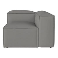 Gray modular corner sofa with sleek lines and a textured fabric pattern, perfect for modern living spaces.