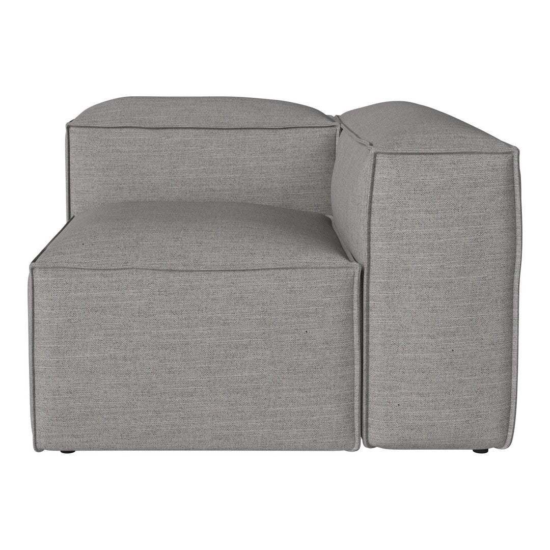 "Grey sectional sofa with a minimalist design and subtle textured fabric."