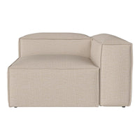 Beige upholstered sectional sofa with a textured pattern, featuring clean lines and a modern design.