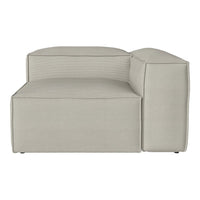 Light gray sectional sofa with subtle ribbed texture and modern geometric design. Perfect for contemporary decor.
