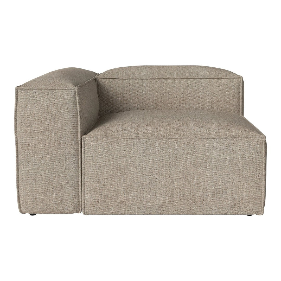 Beige upholstered sectional sofa with a soft, textured fabric and minimalist design.