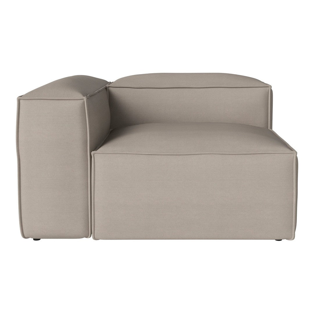 Beige modular couch with smooth, textured fabric and modern, minimalist design. Perfect for contemporary living spaces.