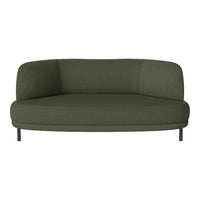 Green curved sofa with a smooth fabric finish and minimalist design, featuring sleek metal legs.