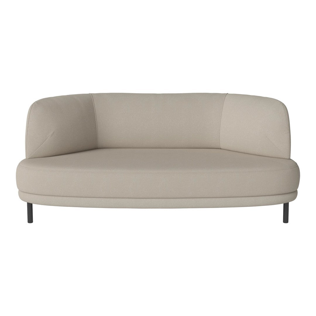 Beige curved modern sofa with smooth upholstery and minimalistic design. Ideal for contemporary living spaces.