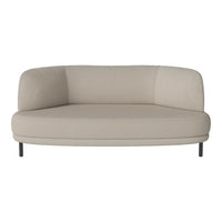 Beige curved modern sofa with smooth upholstery and minimalistic design. Ideal for contemporary living spaces.