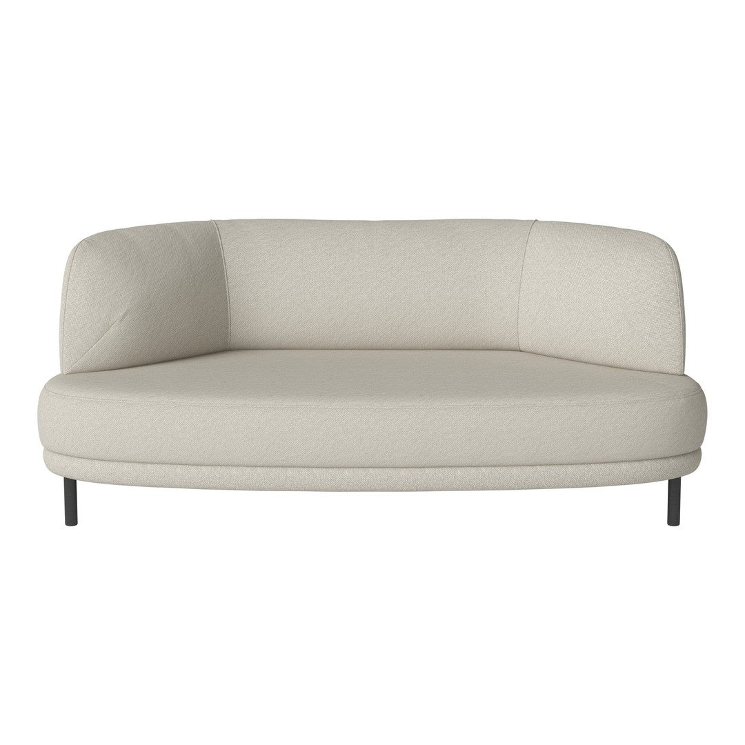 Cream curved sofa with a smooth texture and minimalist design, featuring a neutral color palette and subtle patterns.