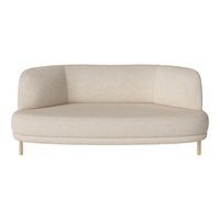 Cream-colored, rounded sofa with a smooth fabric texture and natural wood legs, perfect for modern decor.