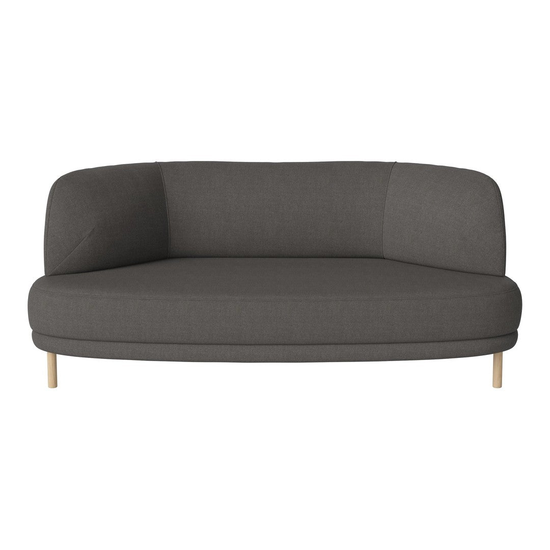 Modern curved sofa in dark gray fabric with minimalist design and light wood legs. Perfect for contemporary spaces.