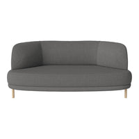 Grey upholstered sofa with rounded edges and wood legs, featuring a minimalist design and subtle texture.