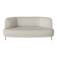 Modern beige curved sofa with a smooth fabric finish and light wooden legs, perfect for any contemporary living space.