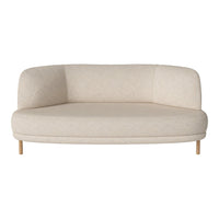 Beige curved sofa with a smooth texture and minimalistic design, featuring light wooden legs.
