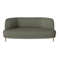 Olive green curved sofa with smooth fabric and light wooden legs, offering a modern and minimalist style.