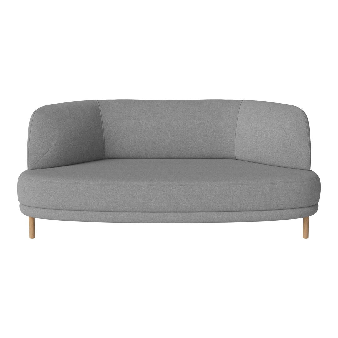 Light gray curved couch with smooth fabric and wooden legs, minimalist design, perfect for modern interiors.