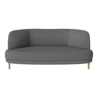 "Modern gray curved sofa with a sleek design and wooden legs, featuring a smooth fabric texture."