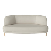Curved two-tone beige sofa with smooth fabric and light wood legs, perfect for modern living spaces.