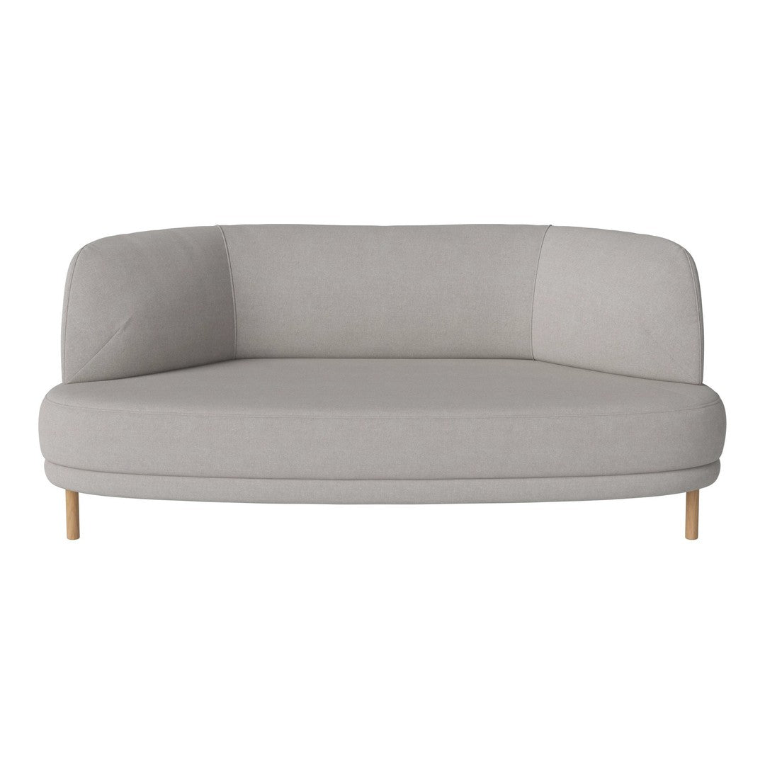 Curved light gray sofa with a smooth texture and wooden legs, featuring a modern minimalist design.