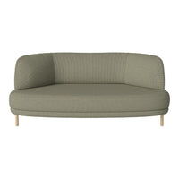 Green upholstered loveseat sofa with a textured pattern and light wooden legs, featuring a curved design.